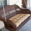 Honey Resin Wicker Porch Swing with Comfort Spring and Hanging Hooks